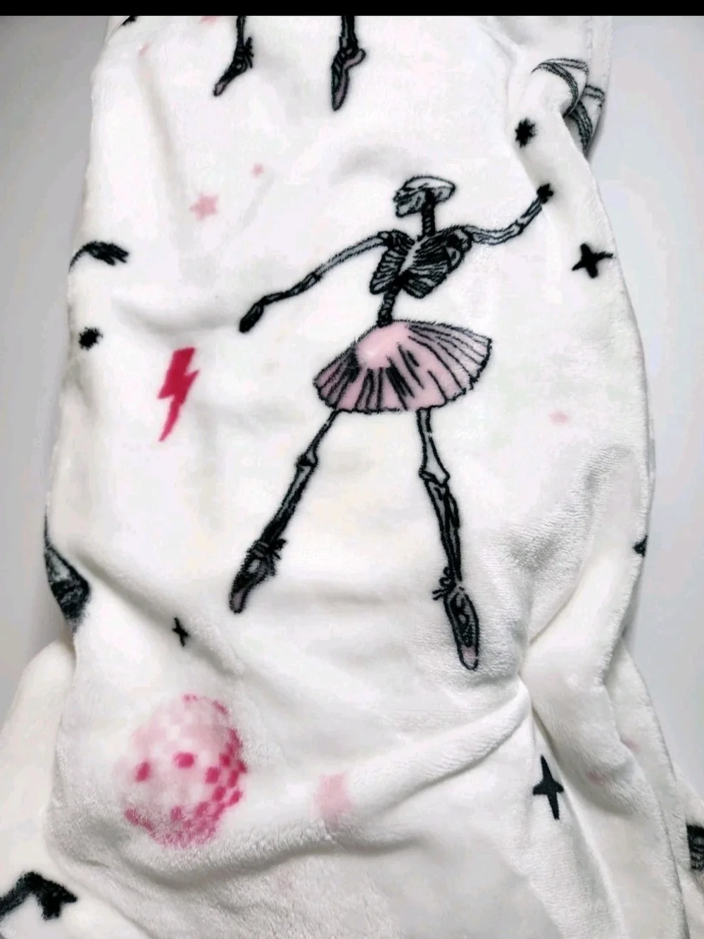 Spooky Hollow Halloween Plush Throw Blanket in White with Dancing Skeletons
